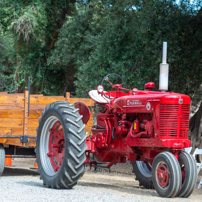 A vintage red tractor on the farm